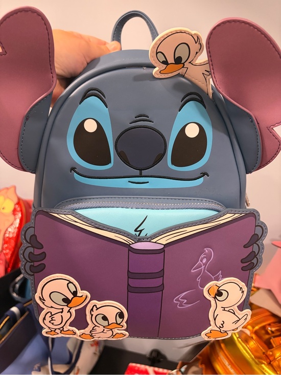 Loungefly Handbags - Loungefly Stitch Reading Mini Backpack in Blue with Purple Book and Pink Ears